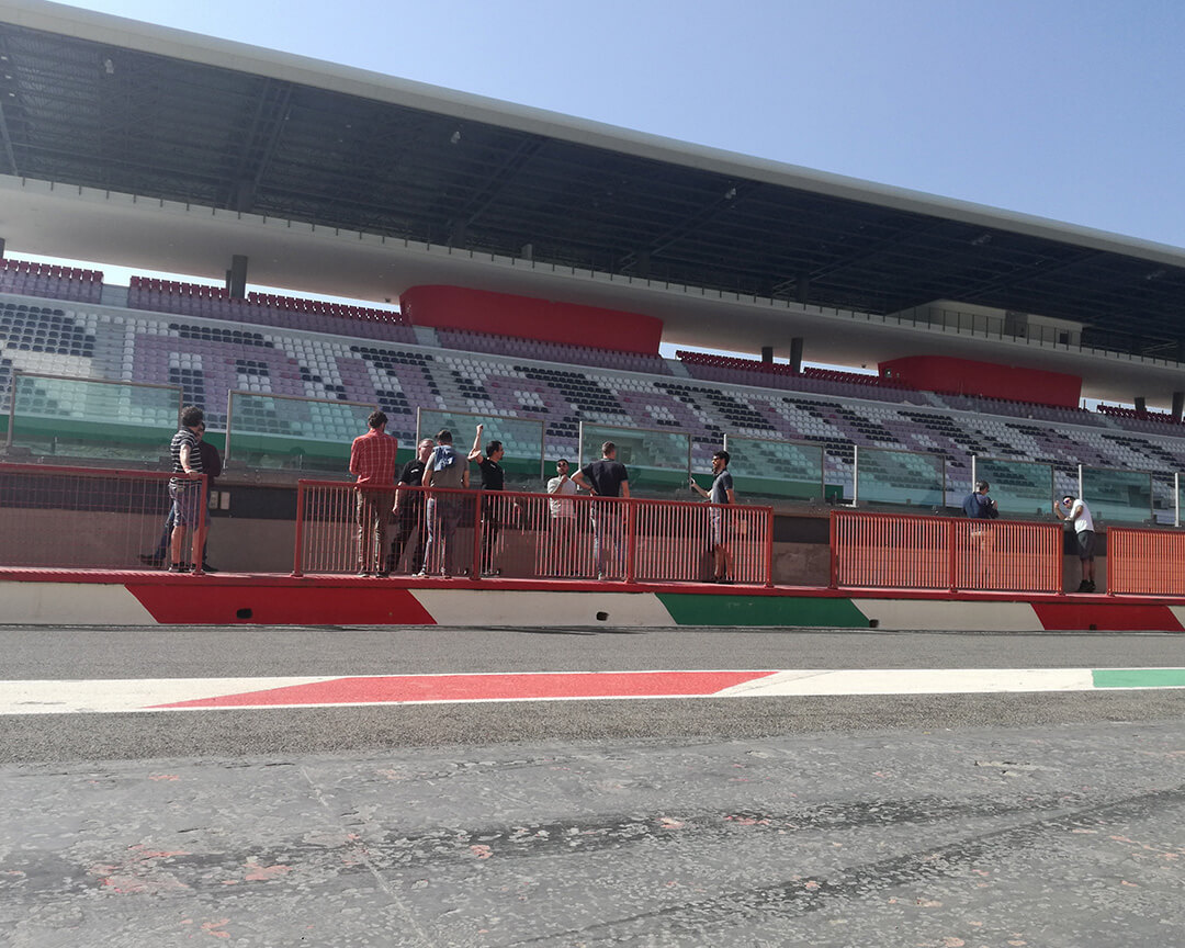 Empty stands and spectators near the circuit