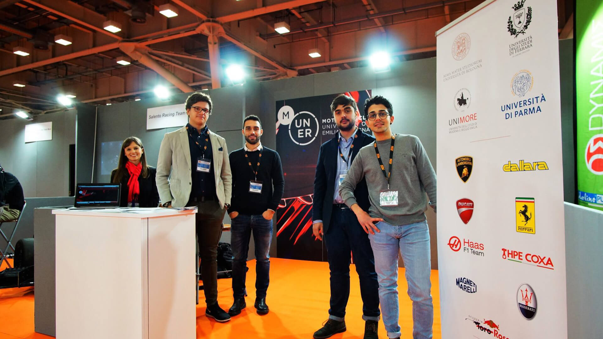 young boys at a stand to present courses offered by muner