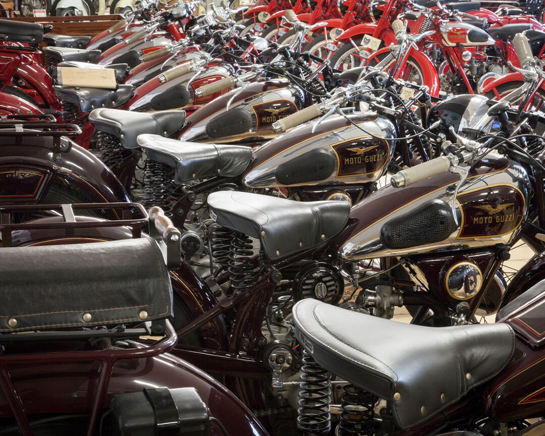 detail of Moto Guzzi logo on vintage motorcycle