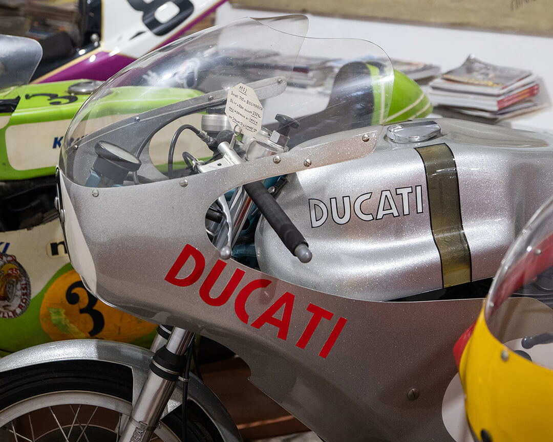 Front part of a vintage ducati from the parmeggiani collection, with the descriptive plate, painted with a metallic silver paint