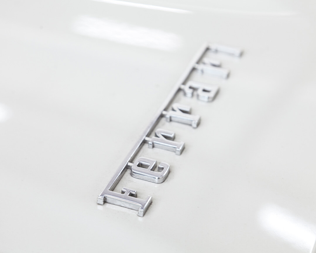 Ferrari logo on white body of a Pollini collection car