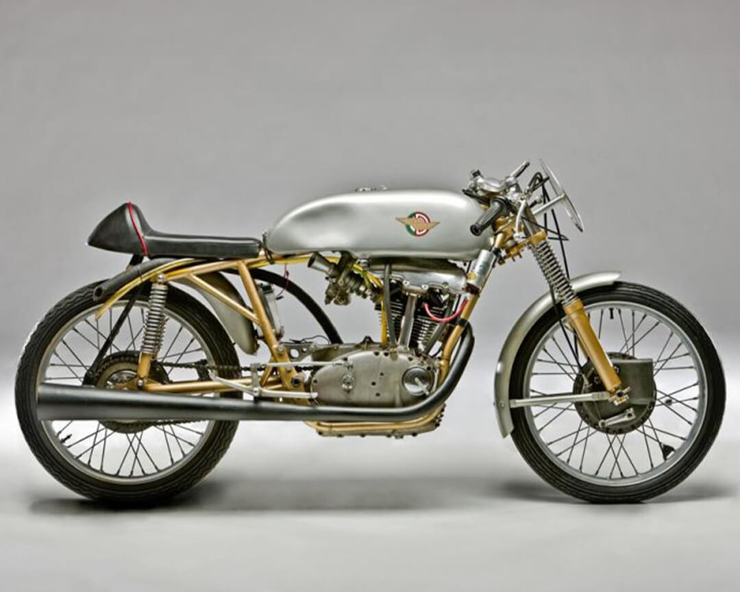 Side view of a collector's mode with exposed chassis, engine and suspension, part of the villa italia collection