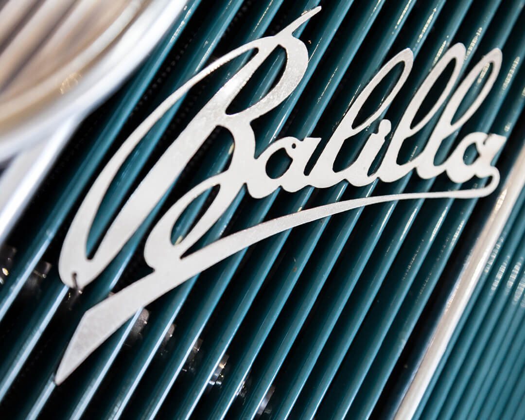 White barilla lettering on the grille of a scuderia san martino classic car