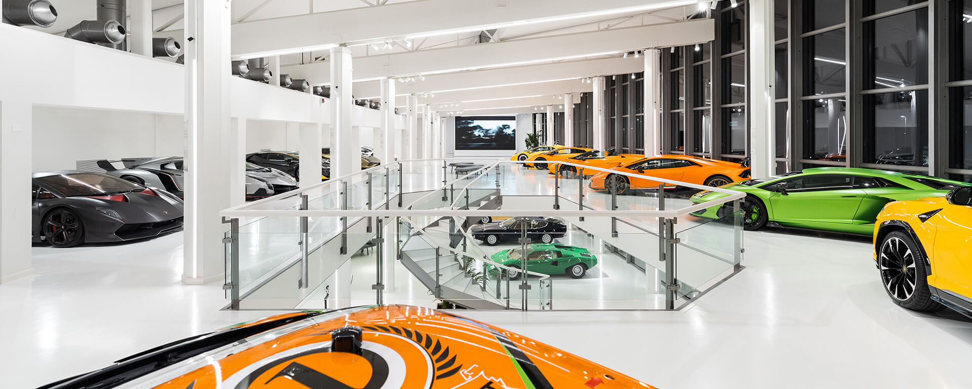 Top view of the museum with several models of Lamborghini sports cars