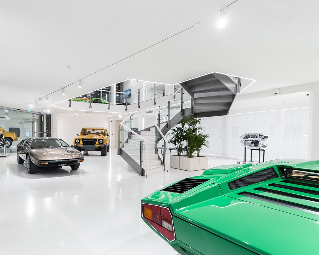 final part of a green lamborghini and two other vintage models