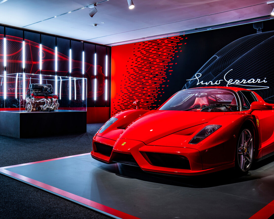 Muso and engine of the historic ferrari model dedicated to enzo ferrari, inside a dedicated room at the ferrari museum in maranello