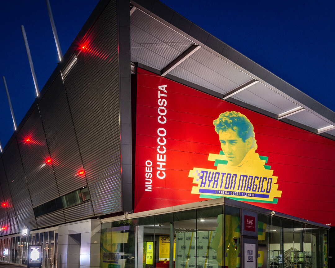 Graffito of Ayrton Senna on red background at the entrance to the Multimedia Museum Autodromo di Imola Checco Costa