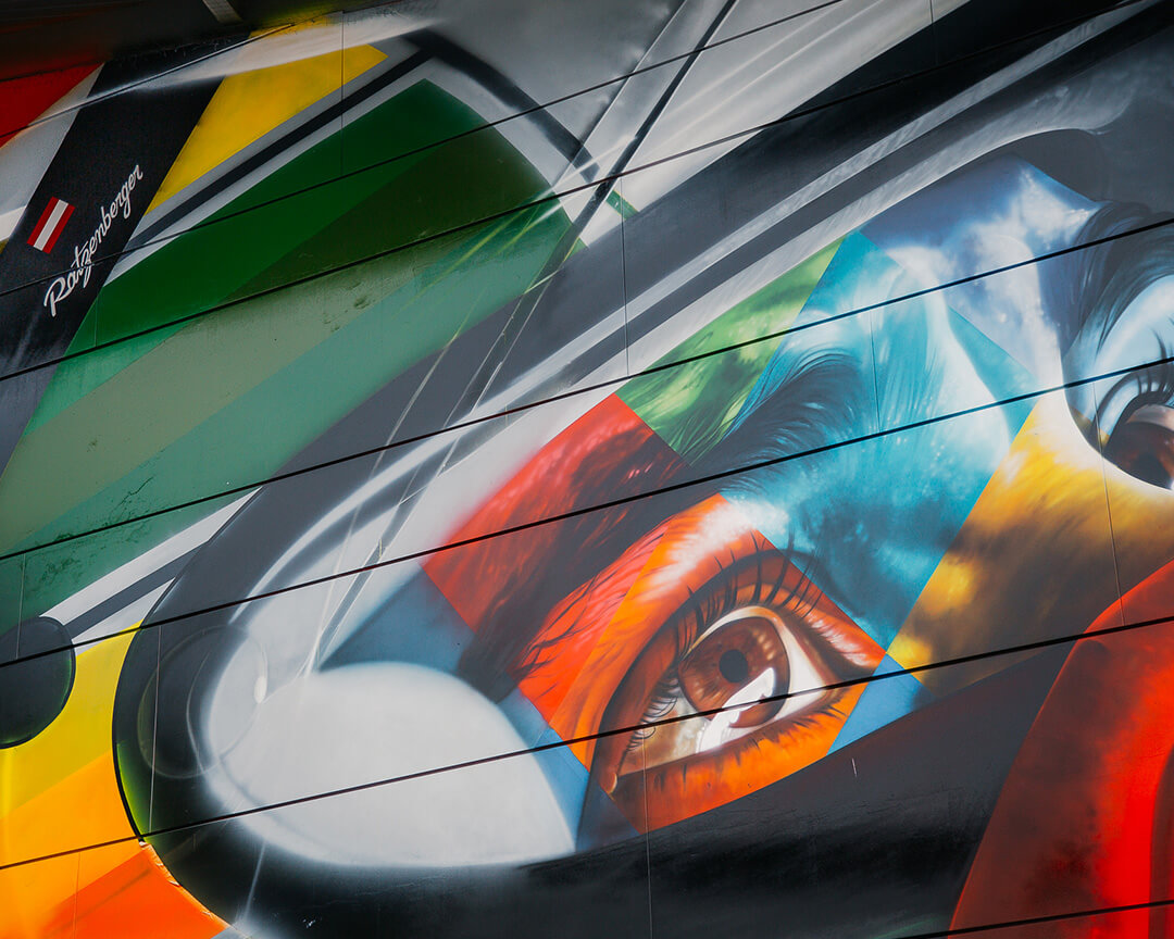 detail of eye and parts of helmet with graffito technique of motorcycle rider