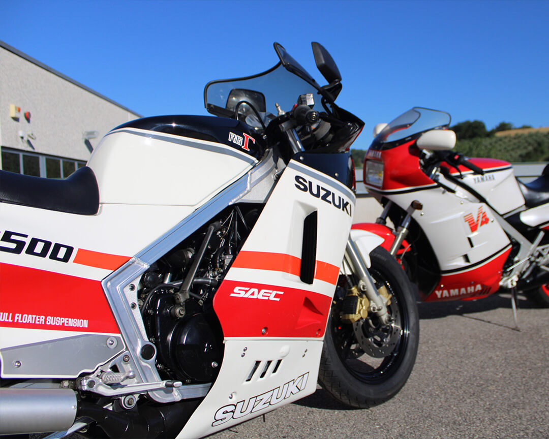A Suzuki and a Yamaha on display at Filibusta Mechanics.