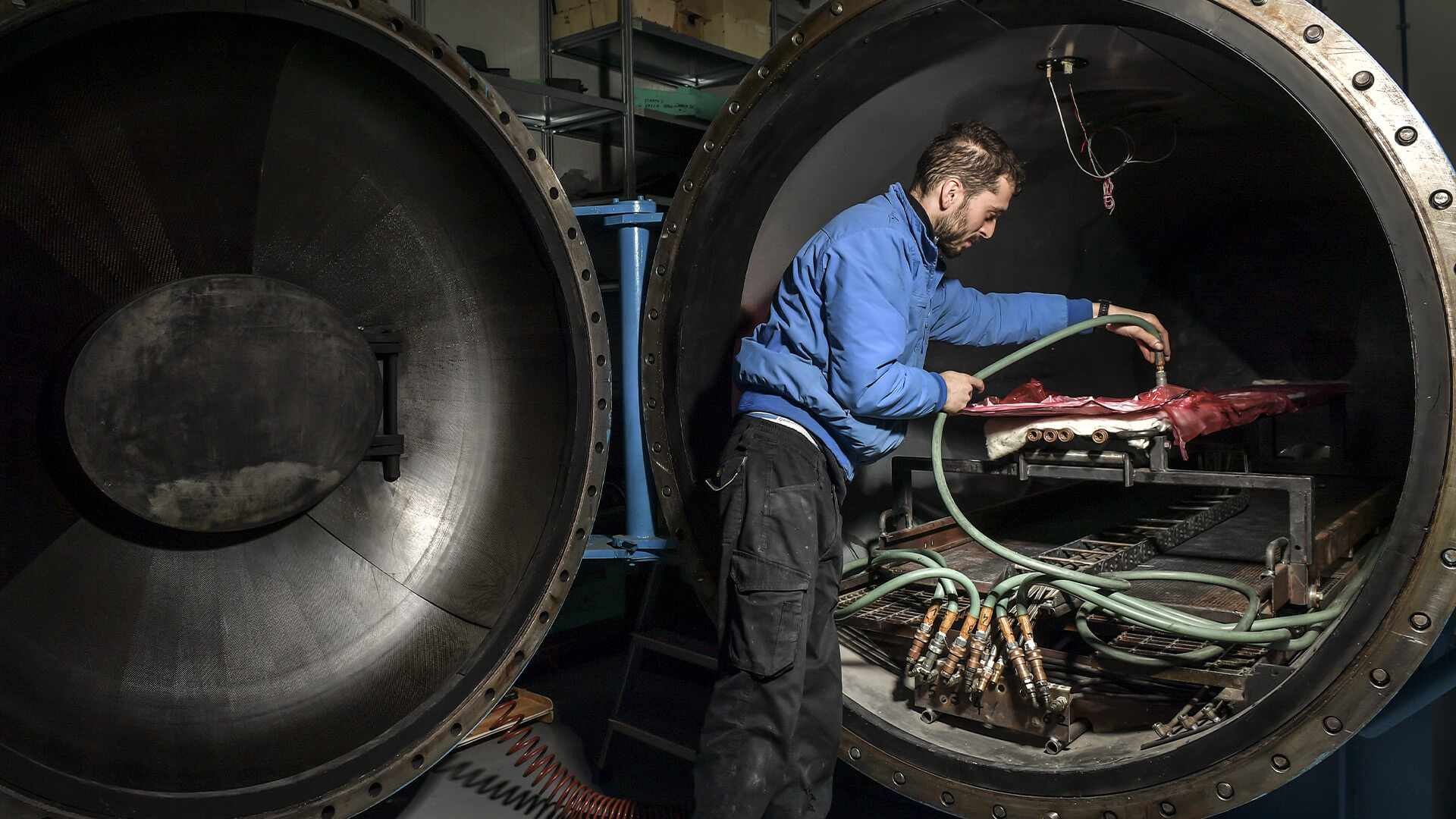 Worker Vins working on a component of a special inside motion chamber