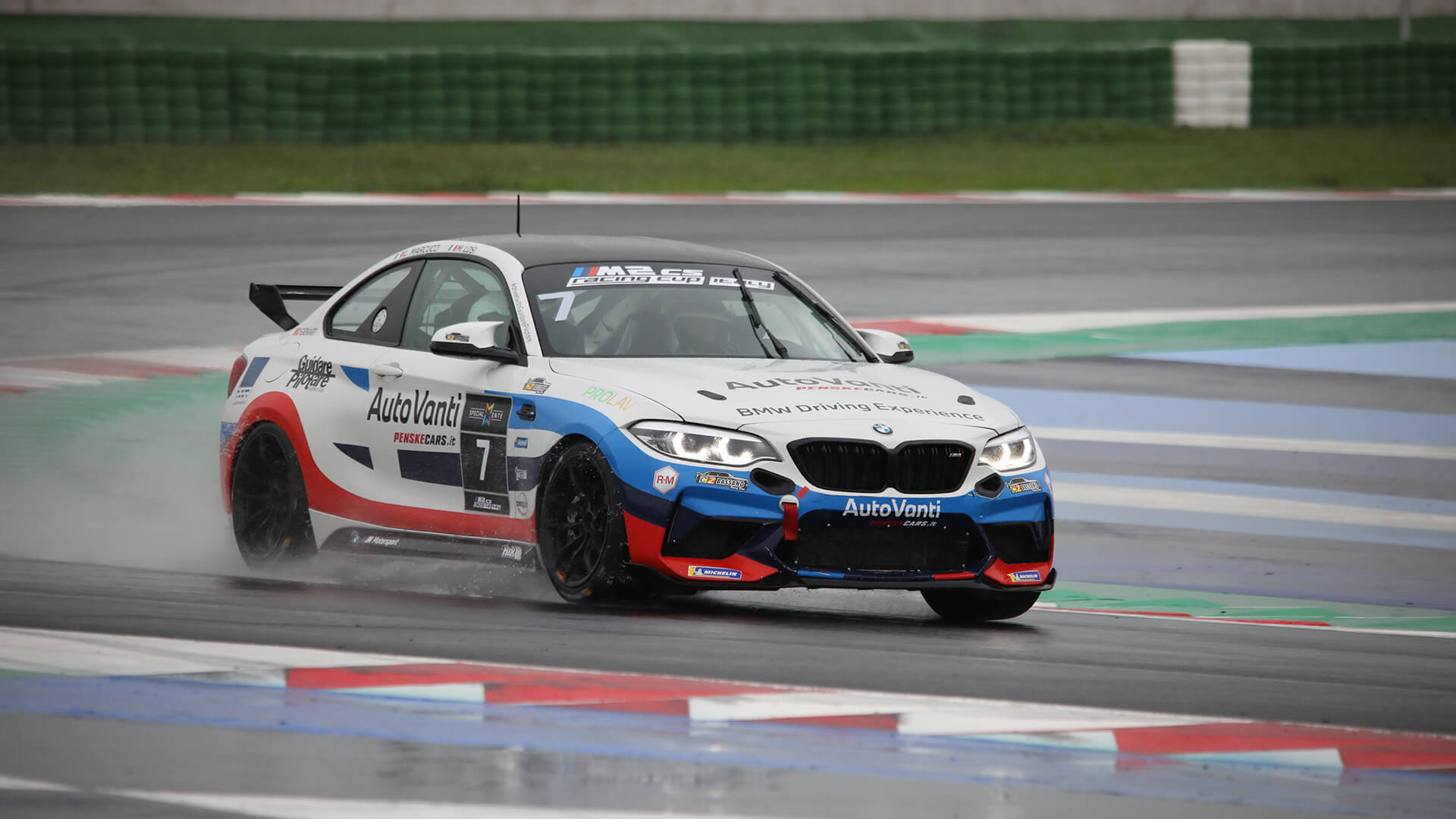 BMW M2 cs racing cup italy by GuidarePilotare, crosses a wet track