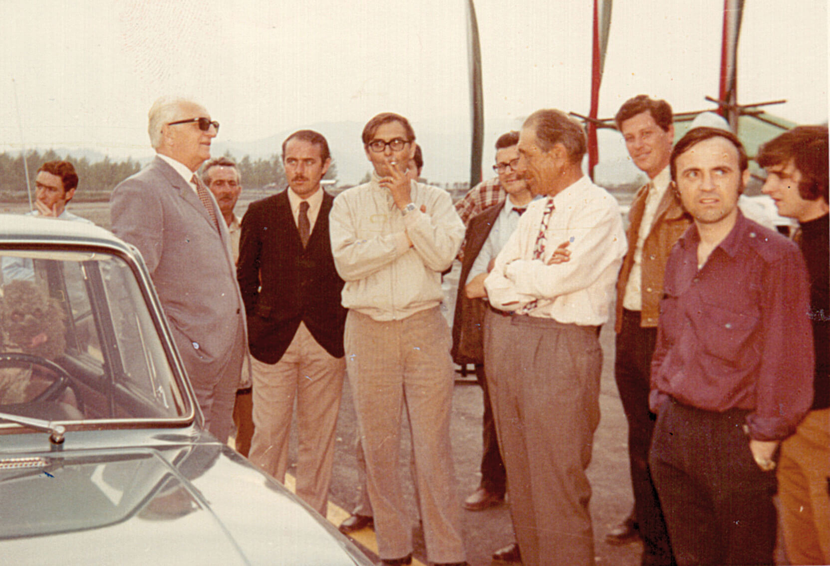 Vintage photos of men standing together talking