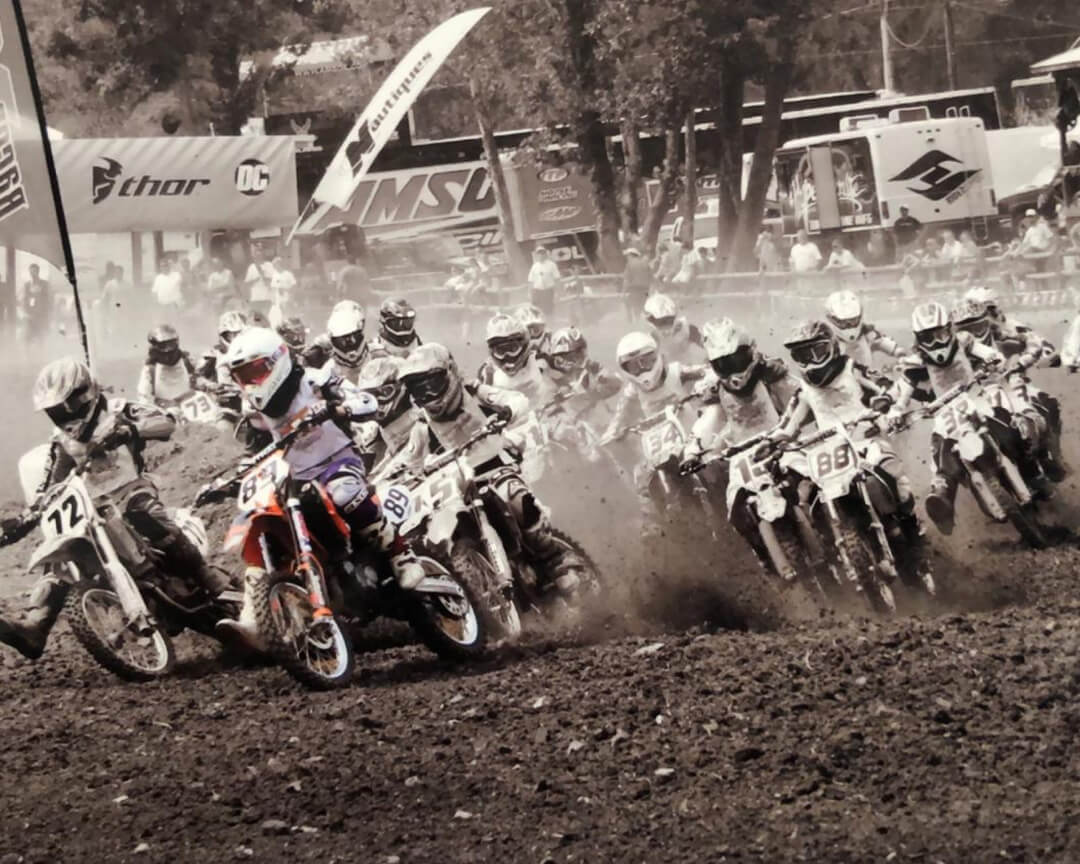 black and white photo of a motocross race where is highlighted kiara fontanesi