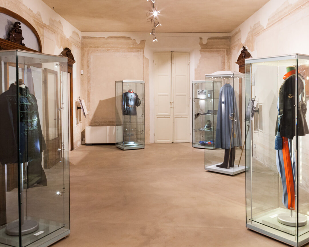 Uniforms on display inside the Francesco Baracca Museum.