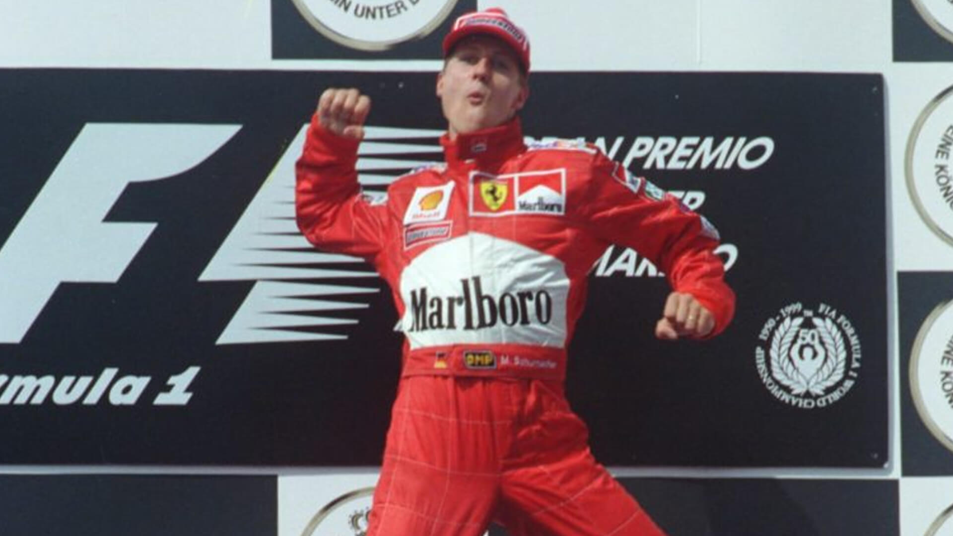 michael schumacher celebrating a grand prix victory