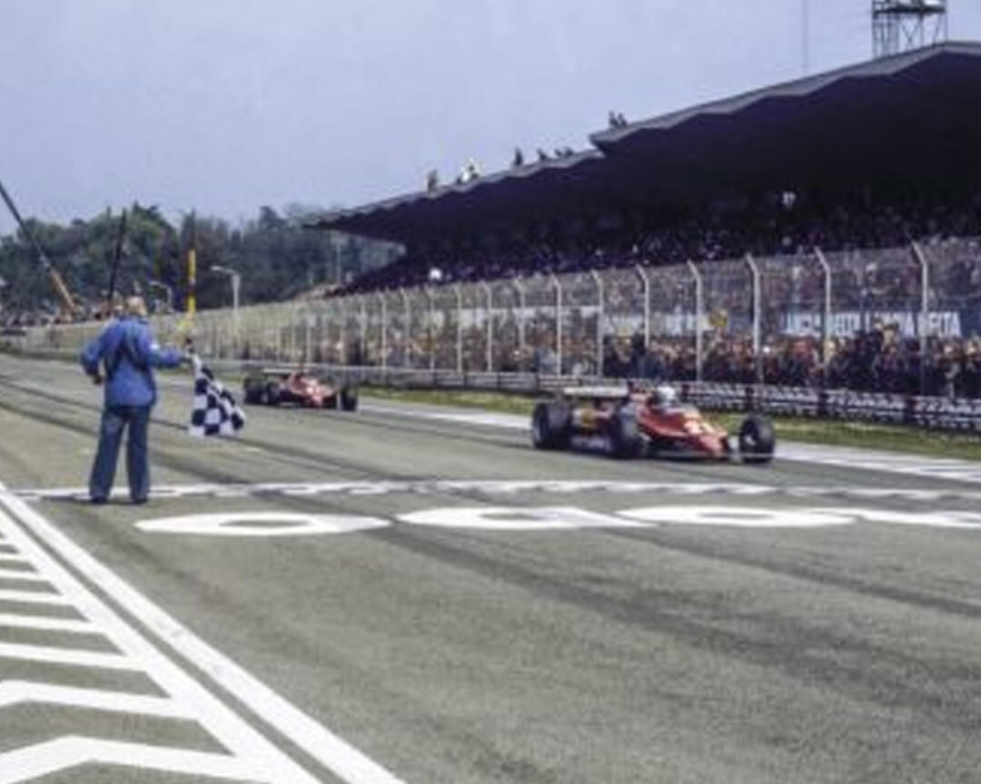 Photo of Pironi precedes Villeneuve at the finish line during a Formula 1 GP at the Imola Autodrome.