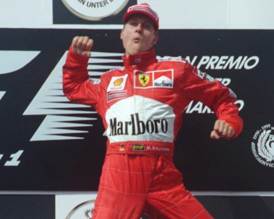 michael schumacher celebrating a grand prix victory