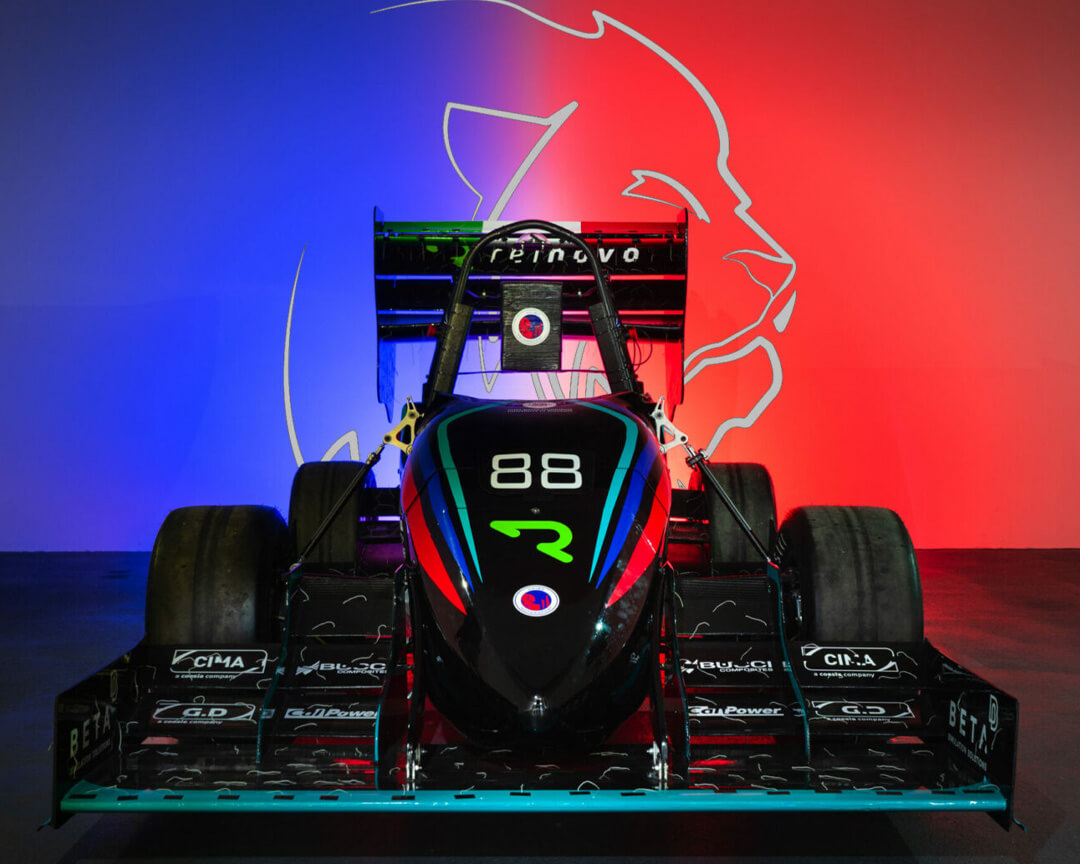 front photo of the car with blue red background and lion logo